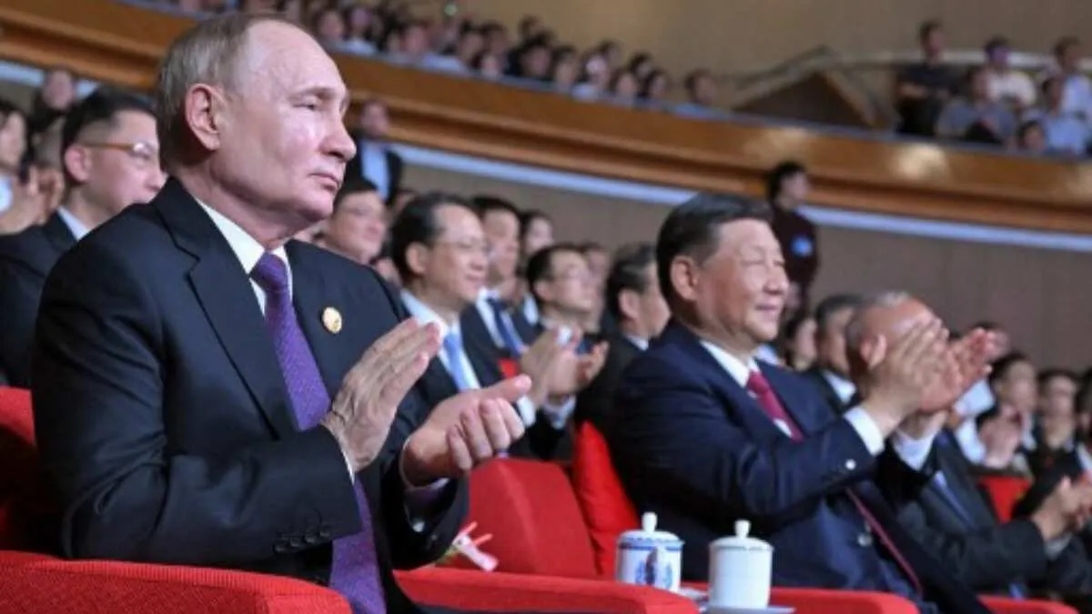 Russia's President Vladimir Putin and China's President Xi Jinping attend a concert marking the 75th anniversary of the establishment of diplomatic relations between Russia and China in Beijing on May 16, 2024